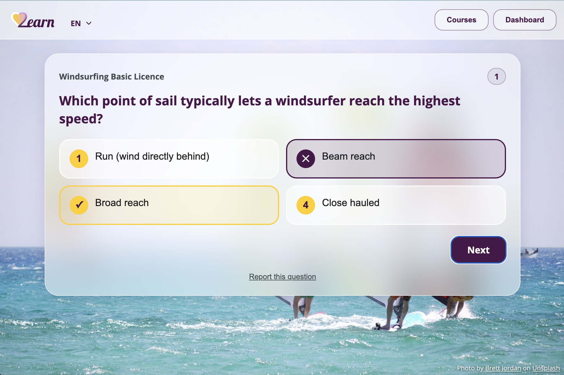 Desktop view of a wrong answer, showing the same right and wrong feedback in a two-column layout with the sea photo backdrop and photo credit